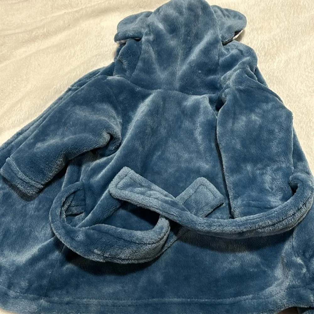 Very soft baby elephant robe with hood and tie. Blue in color! Very warm & soft